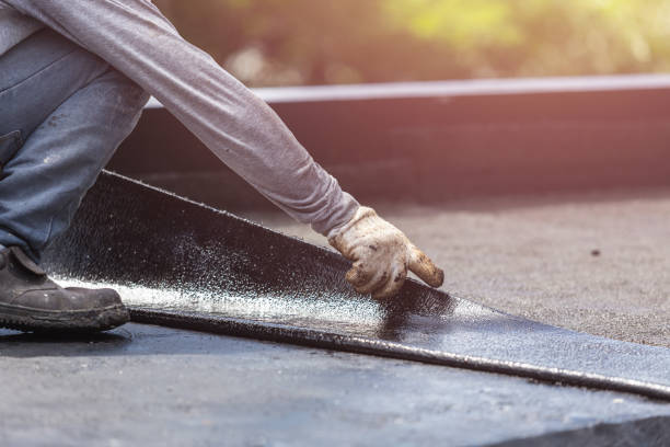 Professional Waterproofing technician working in Riverside, MD